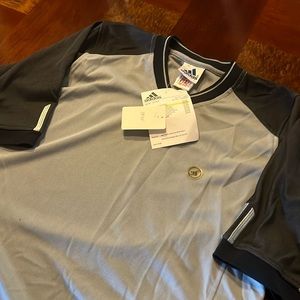 Brand new Adidas Tennis shirt.Short sleeved two shades of gray and black trim